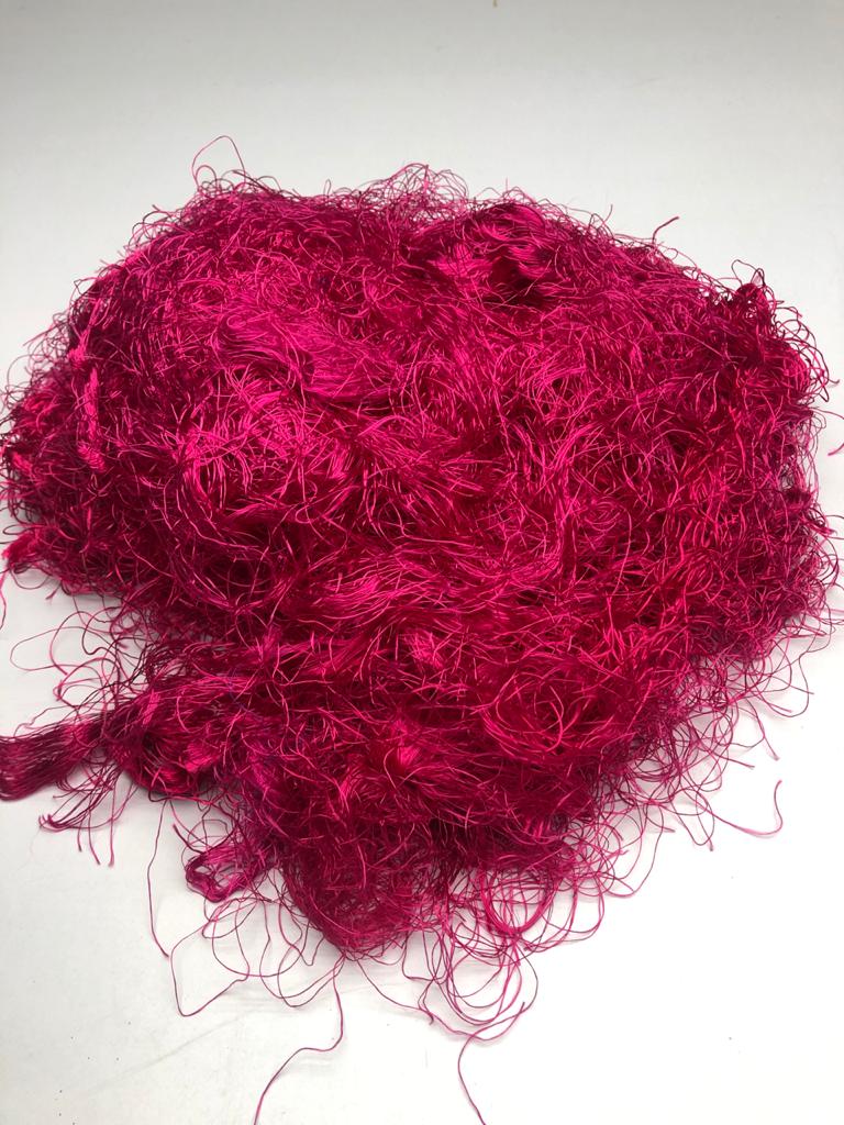 Banana Yarn Fiber have a similar appearance as Recycled Yarn Fibre, the difference being the viscose rayon fiber content in Banana Fibre. The manufacturing process includes refining, processing and cleaning by Women cooperatives using the drop spindle.