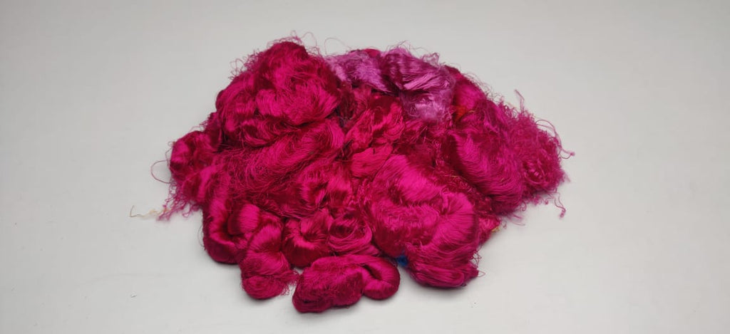 Banana Yarn Fiber have a similar appearance as Recycled Yarn Fibre, the difference being the viscose rayon fiber content in Banana Fibre. The manufacturing process includes refining, processing and cleaning by Women cooperatives using the drop spindle.