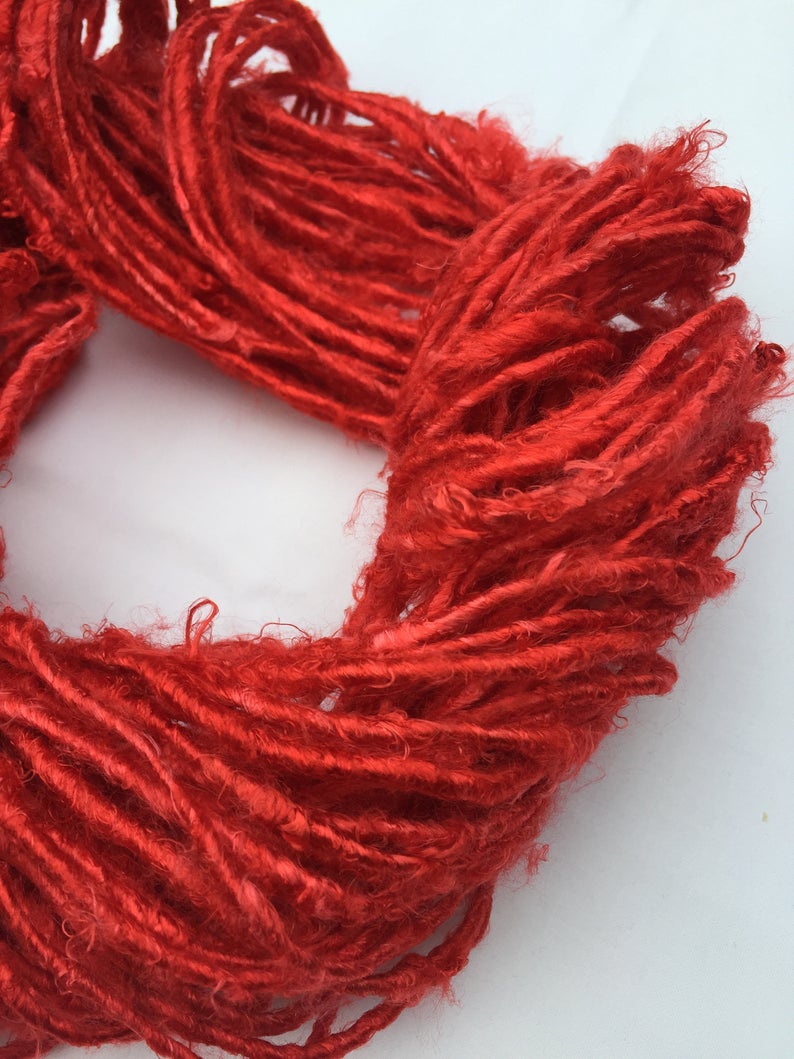 Banana Yarn : It has a similar appearance as Recycled Yarn, the difference being the viscose rayon fiber content in Banana Yarns. We manufacture Banana Yarn using state of the art facility. The manufacturing process includes refining, processing and spinning by Women cooperatives using the drop spindle.