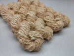 Recycled Linen Yarn Beigi is made from leftover or excessive warp/ weft thread on handlooms / powerloom, to be specific the byproduct linen from industrial Linen weaving unit in India. The yarn is hand-spun, using drop spindle helping women cooperatives to earn their livelihood.