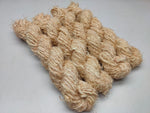 Recycled Linen Yarn Beigi is made from leftover or excessive warp/ weft thread on handlooms / powerloom, to be specific the byproduct linen from industrial Linen weaving unit in India. The yarn is hand-spun, using drop spindle helping women cooperatives to earn their livelihood.