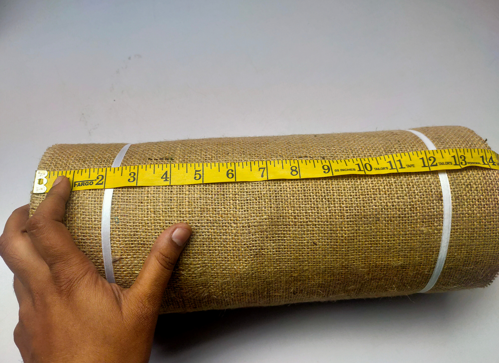Recycled Burlap Ribbon : It is not your ordinary fiber. It's rough but you can make things that need to be rough and ready. Made from reclaimed burlap Sheets. This Burlap Ribbon can bear the heat (and the cold) better than some finer fibers. Bring some organic elegance to your next project or gift wrap!