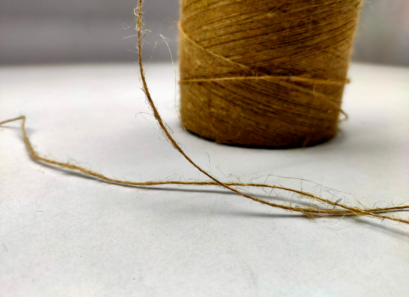 Recycled Burlap Yarn is not your ordinary fiber. It's rough but you can make things that need to be rough and ready. This Burlap Yarn can bear the heat (and the cold) better than some finer fibers.  Bring some organic like elegance to your next project or gift wrap!