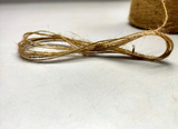 Recycled Burlap Yarn is not your ordinary fiber. It's rough but you can make things that need to be rough and ready. This Burlap Yarn can bear the heat (and the cold) better than some finer fibers.  Bring some organic like elegance to your next project or gift wrap!