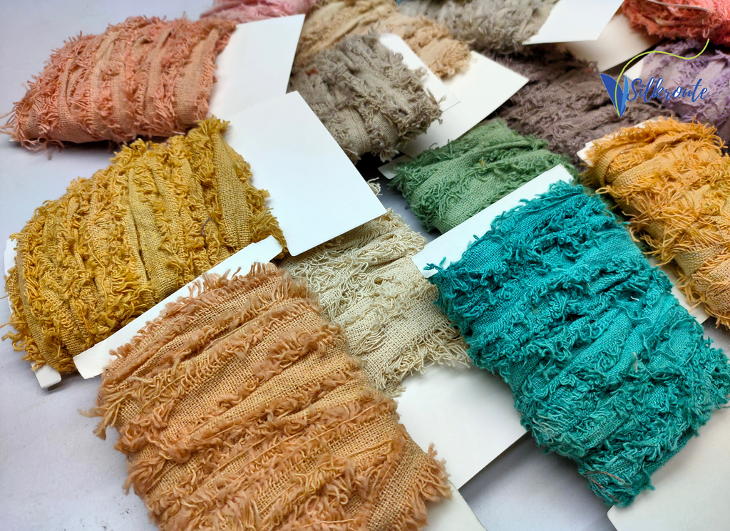 Recycled cotton frizz ribbon is perfect for incorporating into weavings and adding contrasting texture. Cotton frizz ribbon can be used for creating home goods, rugs, wall art, and more. This recycled cotton ribbon is fair trade, ethically sourced from India, and hand dyed in small batches.