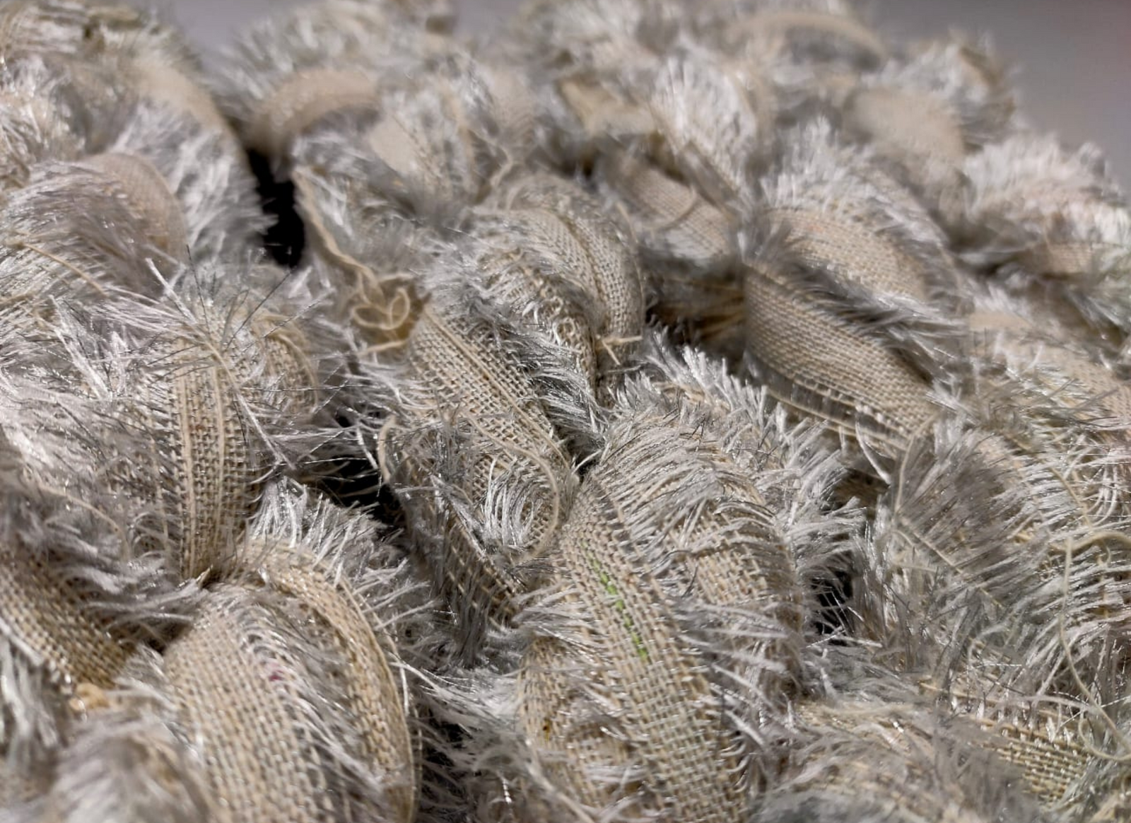 Recycled Metallic Frizz Ribbon is perfect for incorporating into weavings and adding contrasting texture. Metallic Frizz Ribbon can be used for creating home goods, rugs, wall art, and more. This recycled cotton ribbon is fair trade, ethically sourced from India, and hand dyed in small batches.