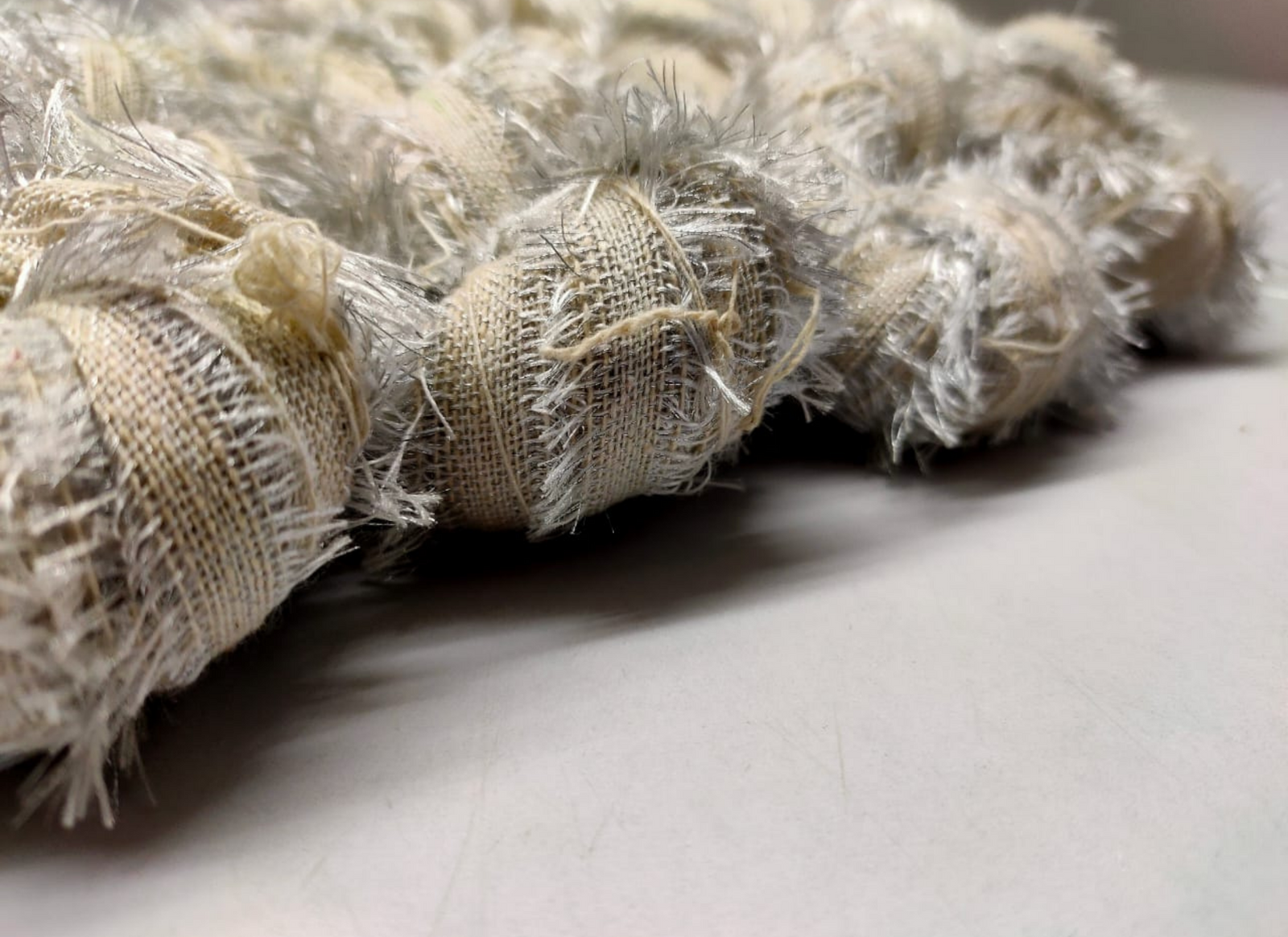 Recycled Metallic Frizz Ribbon is perfect for incorporating into weavings and adding contrasting texture. Metallic Frizz Ribbon can be used for creating home goods, rugs, wall art, and more. This recycled cotton ribbon is fair trade, ethically sourced from India, and hand dyed in small batches.