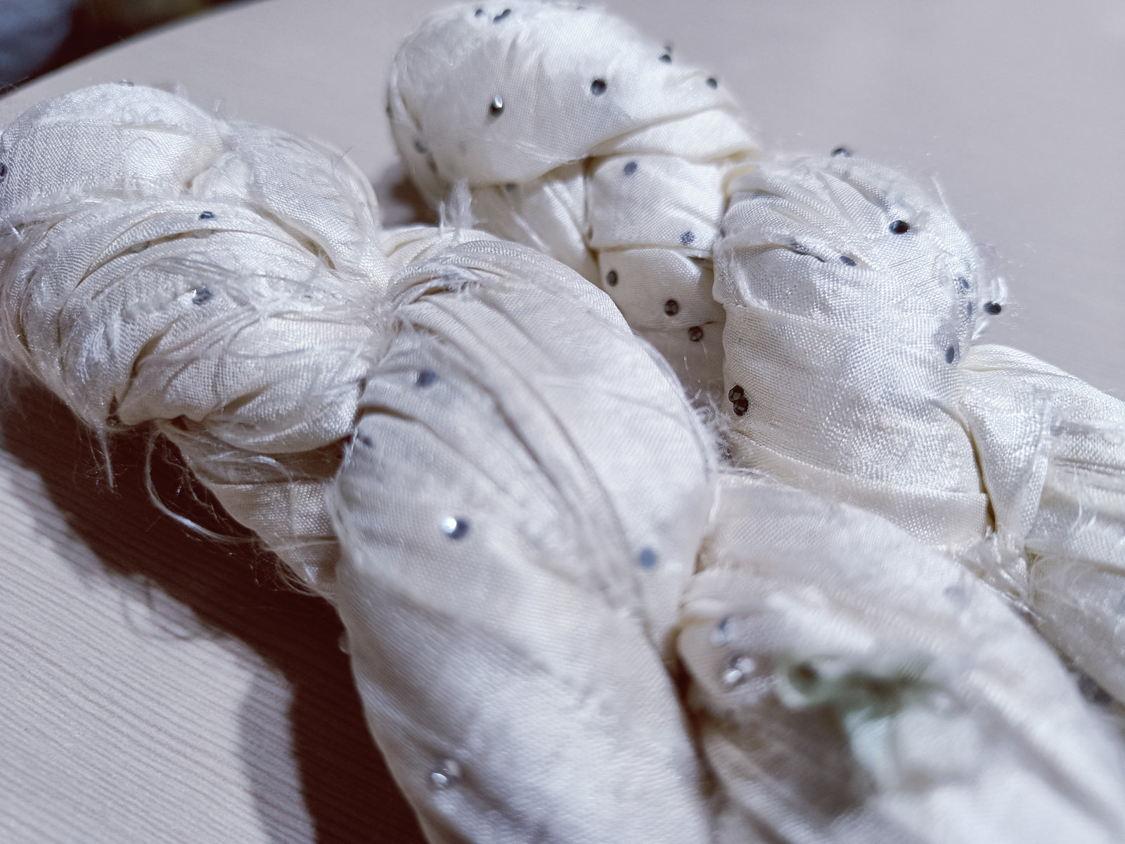 Embellished Recycled Sari silk Ribbon is the by-product of colorful saris that women wear in India.  The vibrant colors and unique texture of these silk fabric, the sari silk ribbons are inspirational to designers, knitters, and artisans.  recycled sari ribbon,  recycled sari silk ribbon yarn, recycled sari ribbon,  recycled ribbon, recycled silk,  recycled sari silk ribbon, ribbon yarn,  sari silk yarn, sari silk ribbon yarn, recycle sari silk