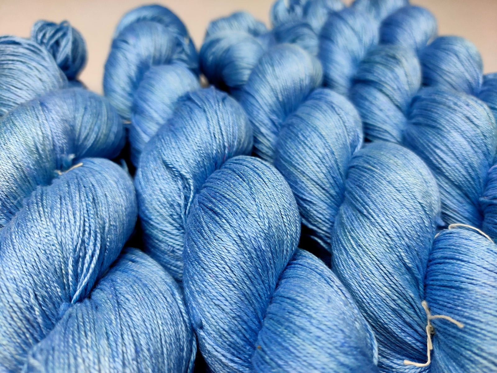 Mulberry Silk yarn (600 mts in 100gram) is a unique Silk Yarn ideal for Knitting. Mulberry Silk is very soft and shiny. It is Sock weight and is directly spun from the premium Mulberry Silk Tops. It is a yarn of Natural Protein Fiber. Mulberry Silk Yarn has compact structure, evenness, clean appearance, elegant luster, Good moisture-absorbing capability, good strength and elongation, with fine and soft fibers. It is useful for Weaving and Knitting.