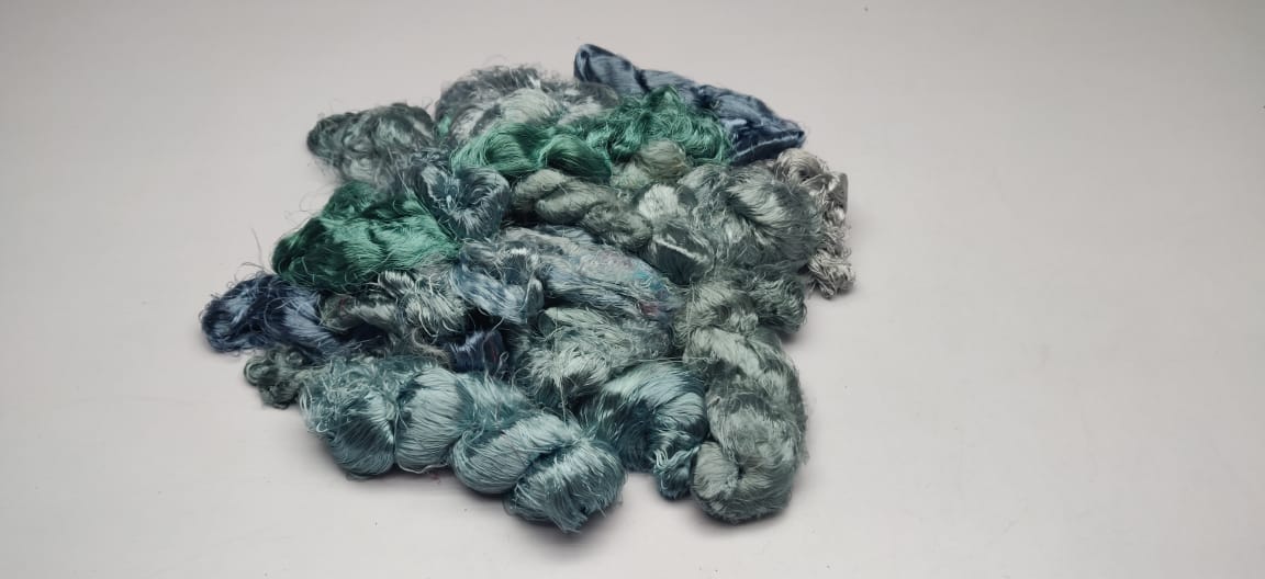  Banana Yarn Fiber- Grey  It has a similar appearance as Recycled Yarn Fibre, the difference being the viscose rayon fiber content in Banana Fibre.