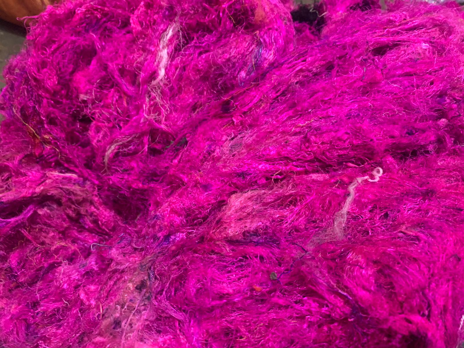 Recycled Sari Silk waste Batts are the strongest natural fibers and is spun into a wonderful yarn used for knitting and weaving! The Silk Batts have a lovely draping quality. The batts is a smooth filament and the fabric out of it is comfortable against the skin. Silk is a natural protein fiber. Silk Batts are well known for its shine, lustre and tensile strength. This fiber is recycled and carded or processed into roving or batts form. This fiber is created as a byproduct of Sari production in India.