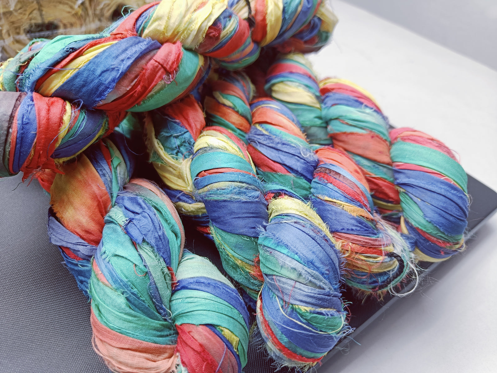 recycle sari ribbon, recycled sari ribbon,recycled sari silk ribbon,   recycled sari silk ribbon yarn, recycled sari ribbon,  recycled ribbon, recycled silk,  recycled sari silk ribbon, sari silk yarn