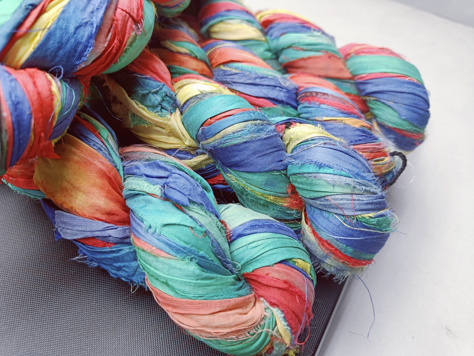 recycle sari ribbon, recycled sari ribbon,recycled sari silk ribbon,   recycled sari silk ribbon yarn, recycled sari ribbon,  recycled ribbon, recycled silk,  recycled sari silk ribbon, sari silk yarn