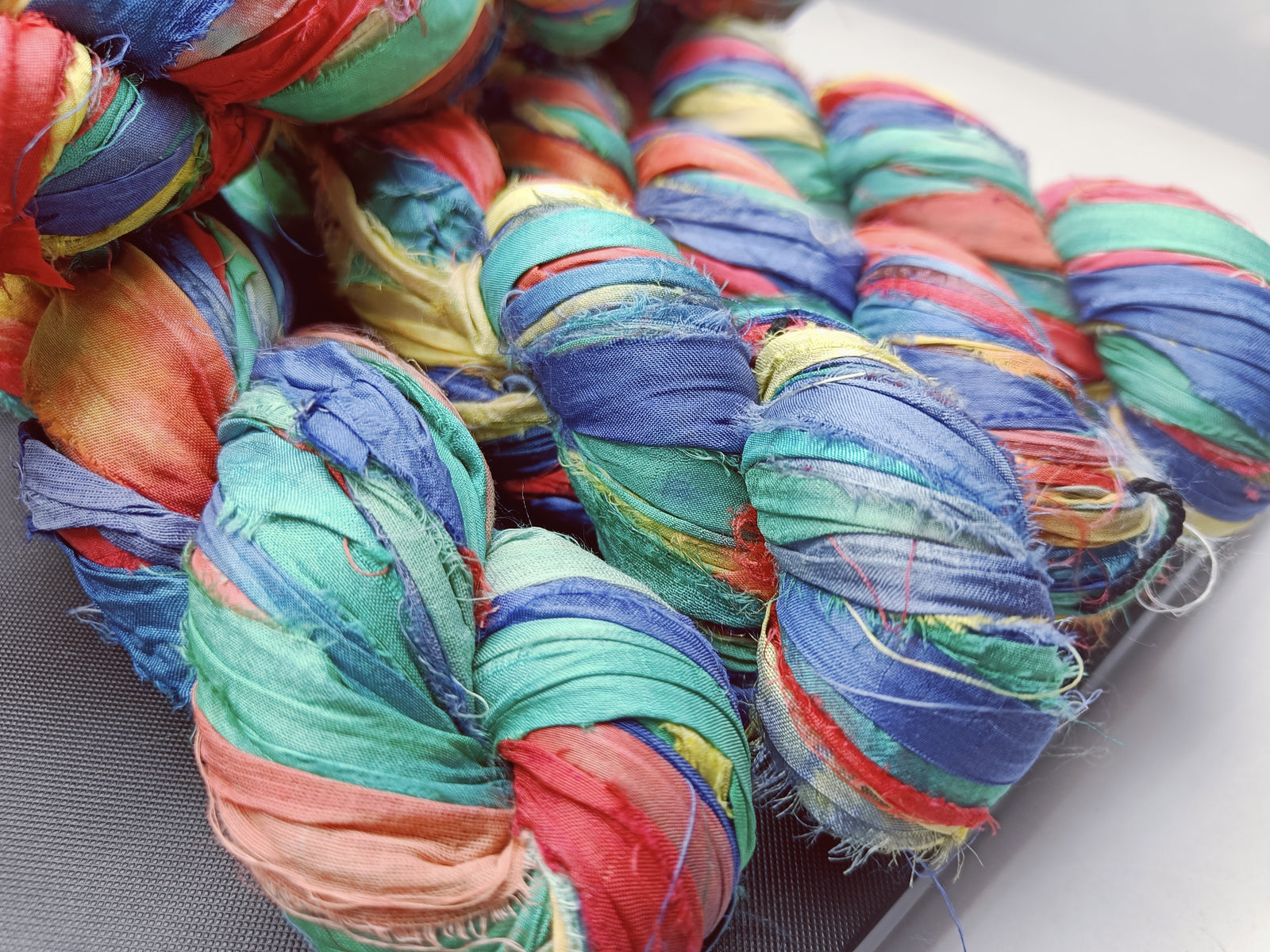 recycle sari ribbon, recycled sari ribbon,recycled sari silk ribbon,   recycled sari silk ribbon yarn, recycled sari ribbon,  recycled ribbon, recycled silk,  recycled sari silk ribbon, sari silk yarn