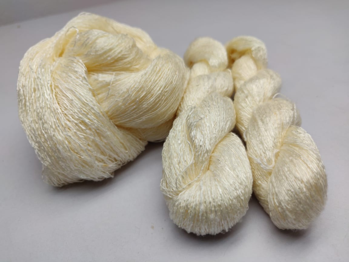 handspun Matka Silk Yarn that is obtained from the waste Mulberry Silk. We manufacture pure Matka Silk Yarn through hand spinning the Mulberry Silk without removing the gum. This wild silk is only produced in India. We are counted amongst reckoned names in the industry, committed towards offering a wide assortment of Matka Silk Yarn. Silk yarns are produce by Underprivileged Hand spinners from Eastern India. These silk yarns are widely used in different textile industries to manufacture various garments.