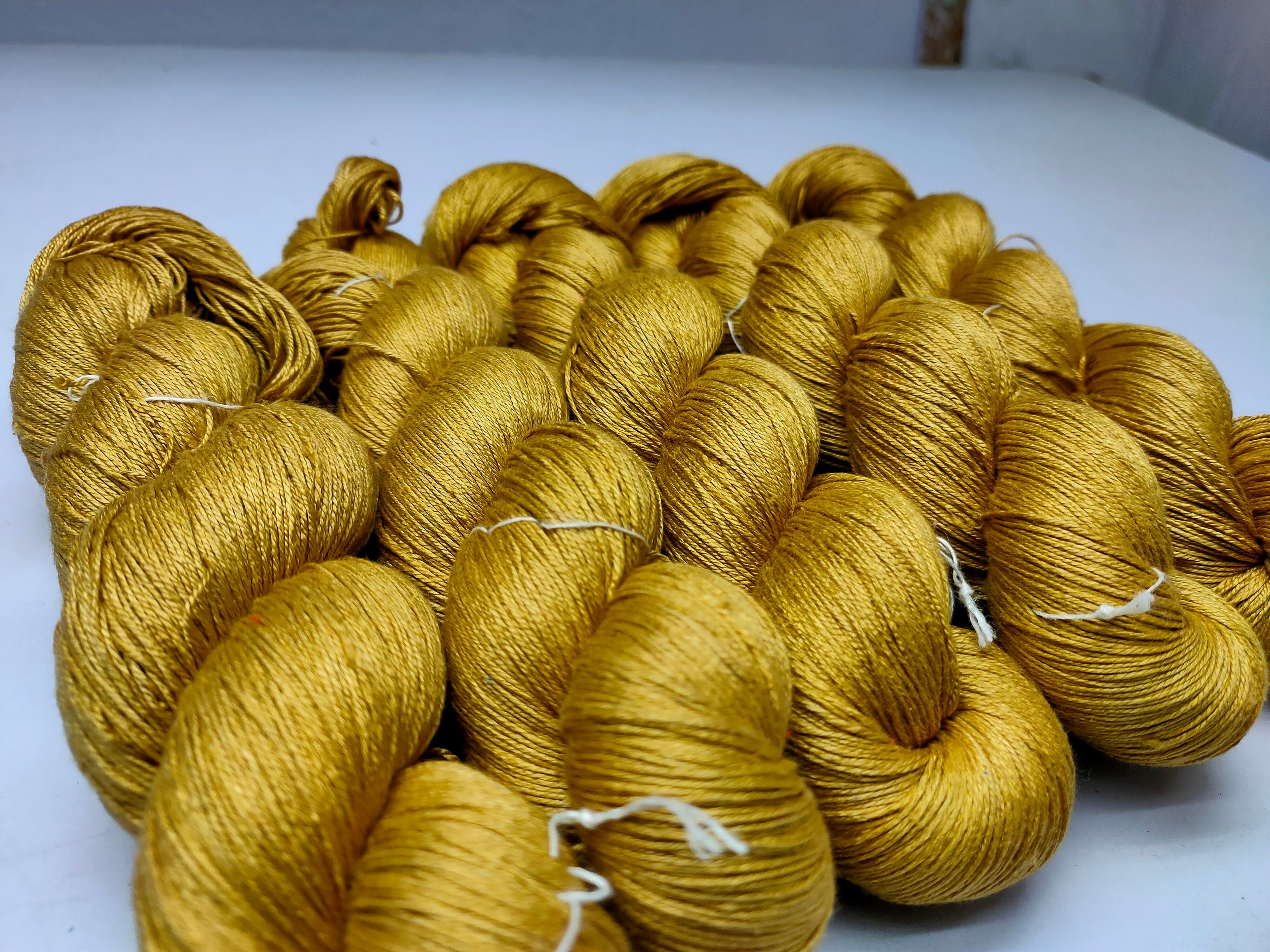 Mulberry Silk yarn (600 mts in 100gram) is a unique Silk Yarn ideal for Knitting. Mulberry Silk is very soft and shiny. It is Sock weight and is directly spun from the premium Mulberry Silk Tops. It is a yarn of Natural Protein Fiber. Mulberry Silk Yarn