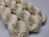 Mulberry Silk yarn (600 mts in 100gram) is a unique Silk Yarn ideal for Knitting. Mulberry Silk is very soft and shiny. It is Sock weight and is directly spun from the premium Mulberry Silk Tops. It is a yarn of Natural Protein Fiber. Mulberry Silk Yarn has compact structure, evenness, clean appearance, elegant luster, Good moisture-absorbing capability, good strength and elongation, with fine and s