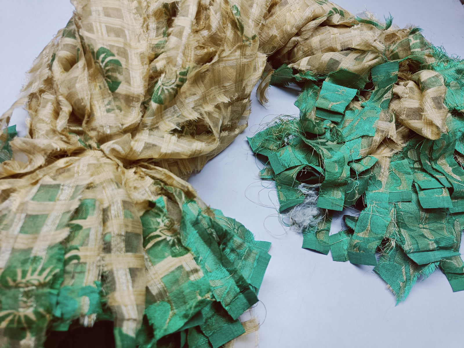 Reclaimed Indian Sari Stripe is the by-product of colorful saris that women wear in India. It is the loose ends of saris collected from industrial mills in India that is torn in stripes to make beautiful and colorful stripes. The vibrant colors and unique texture of these sari stripe, the sari Stripe are inspirational to designers, knitters, and artisans. The popularity of Sari Stripe has extended beyond India and has created an empowering cottage industry primarily benefiting women.