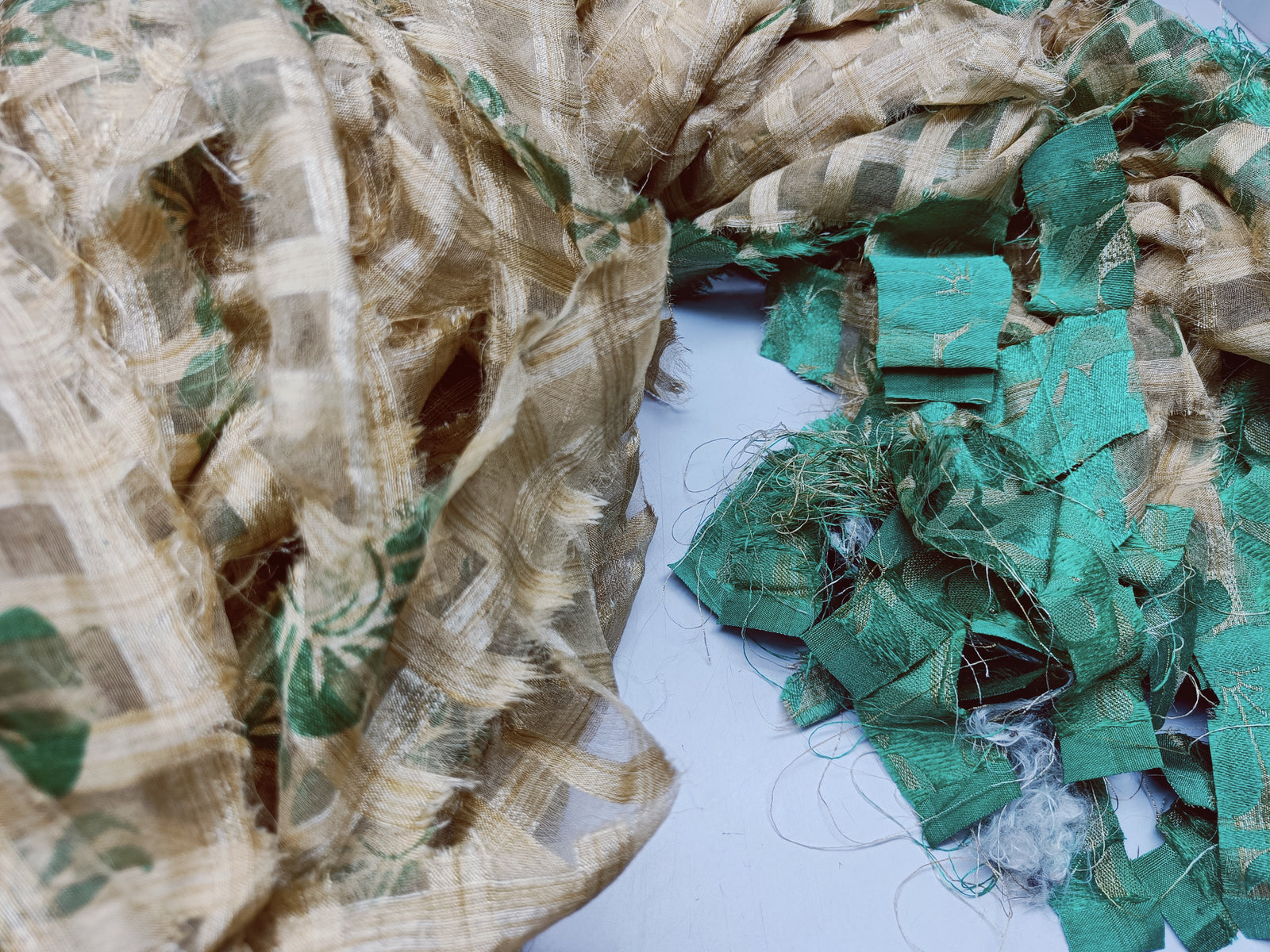 Reclaimed Indian Sari Stripe is the by-product of colorful saris that women wear in India. It is the loose ends of saris collected from industrial mills in India that is torn in stripes to make beautiful and colorful stripes. The vibrant colors and unique texture of these sari stripe, the sari Stripe are inspirational to designers, knitters, and artisans. The popularity of Sari Stripe has extended beyond India and has created an empowering cottage industry primarily benefiting women.