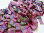 Reclaimed Indian Sari Stripe is the by-product of colorful saris that women wear in India. It is the loose ends of saris collected from industrial mills in India that is torn in stripes to make beautiful and colorful stripes. The vibrant colors and unique texture of these sari stripe, the sari Stripe are inspirational to designers, knitters, and artisans. The popularity of Sari Stripe has extended beyond India and has created an empowering cottage industry primarily benefiting women.