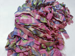 Reclaimed Indian Sari Stripe is the by-product of colorful saris that women wear in India. It is the loose ends of saris collected from industrial mills in India that is torn in stripes to make beautiful and colorful stripes. The vibrant colors and unique texture of these sari stripe, the sari Stripe are inspirational to designers, knitters, and artisans. The popularity of Sari Stripe has extended beyond India and has created an empowering cottage industry primarily benefiting women.