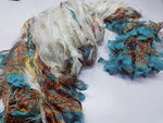 Reclaimed Indian Sari Stripe is the by-product of colorful saris that women wear in India. It is the loose ends of saris collected from industrial mills in India that is torn in stripes to make beautiful and colorful stripes. The vibrant colors and unique texture of these sari stripe, the sari Stripe are inspirational to designers, knitters, and artisans. The popularity of Sari Stripe has extended beyond India and has created an empowering cottage industry primarily benefiting women.