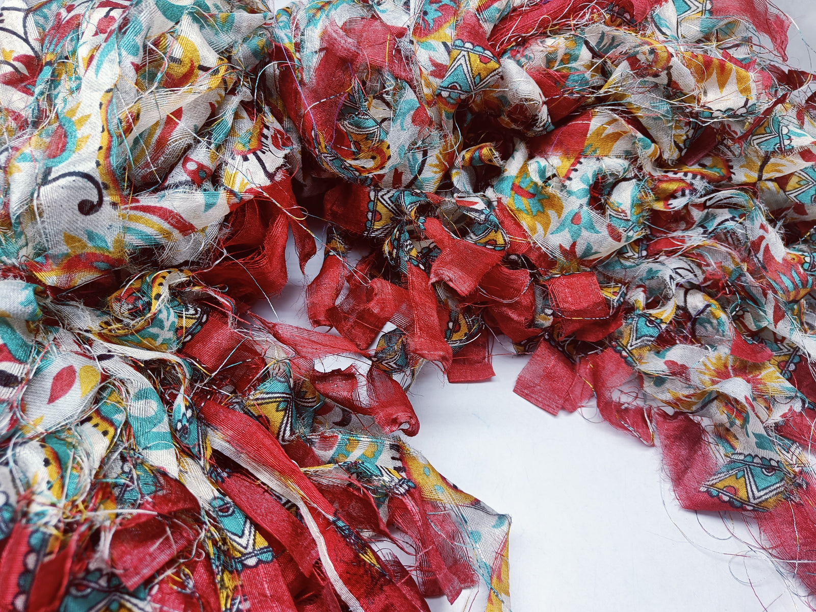 This Sari Stripe is made of completely recycled Sari material from recycled clothing. We work with women’s Cooperative in the countryside to produce this unique sari Stripe and other hand knitted silk yarn products.