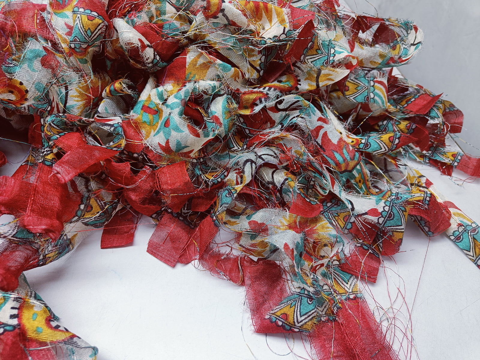 This Sari Stripe is made of completely recycled Sari material from recycled clothing. We work with women’s Cooperative in the countryside to produce this unique sari Stripe and other hand knitted silk yarn products.