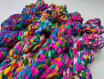 Braided yarn is made of pure silk and is approximately an inch wide through out. Due to its handmade nature there might occasionally be variations in width. When silk fabric is cut and made into saris, wraps, and veils, there is always a bit left over. Rather than throw that waste fiber into the trash, it has been made into a beautiful, unique, soft yarn..!! Direct from India, this yarn is a truly recycled product. It is a bulky weight and is soft and easy to knit or crochet.