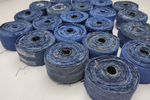 Recycled Denim Ribbon/ Denim Cotton Ribbon is the by-product of jeans wear in India. Are you planning to buy Denim Ribbon Online? The jeans are washed and then torn in stripes and sewn end to end to make beautiful.