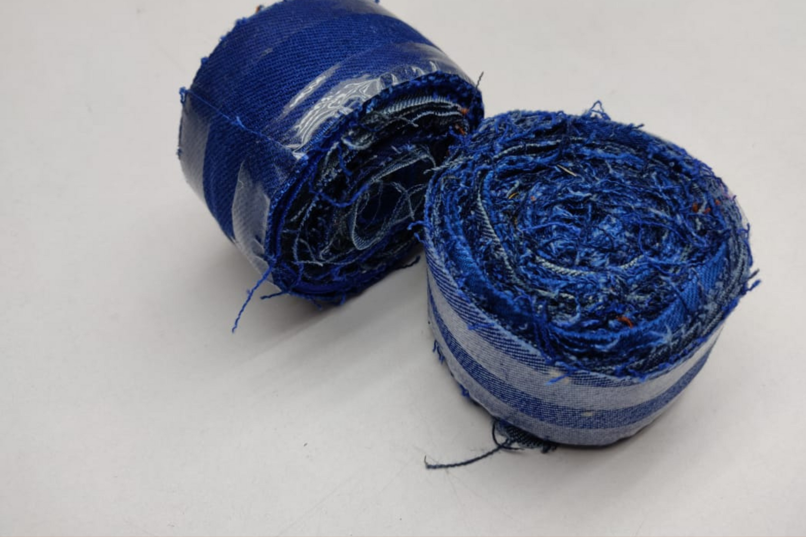 Recycled Denim Ribbon/ Denim Cotton Ribbon is the by-product of jeans wear in India. Are you planning to buy Denim Ribbon Online? The jeans are washed and then torn in stripes and sewn end to end to make beautiful.