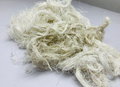 Recycled Linen Yarn Waste are the leftover or excessive warp/ weft thread on handlooms/ powerloom, to be specific the byproduct linen from industrial Linen weaving unit in India. There’s no dye lot on recycled Linen Fiber. These recycled fiber waste are the remnants of traditionally crafted Indian Linen yarn and are extensively used in making hats, mittens & hand scarves. Each lot has distinct colors, as its a mixed lot of white, natural white, off White or undy