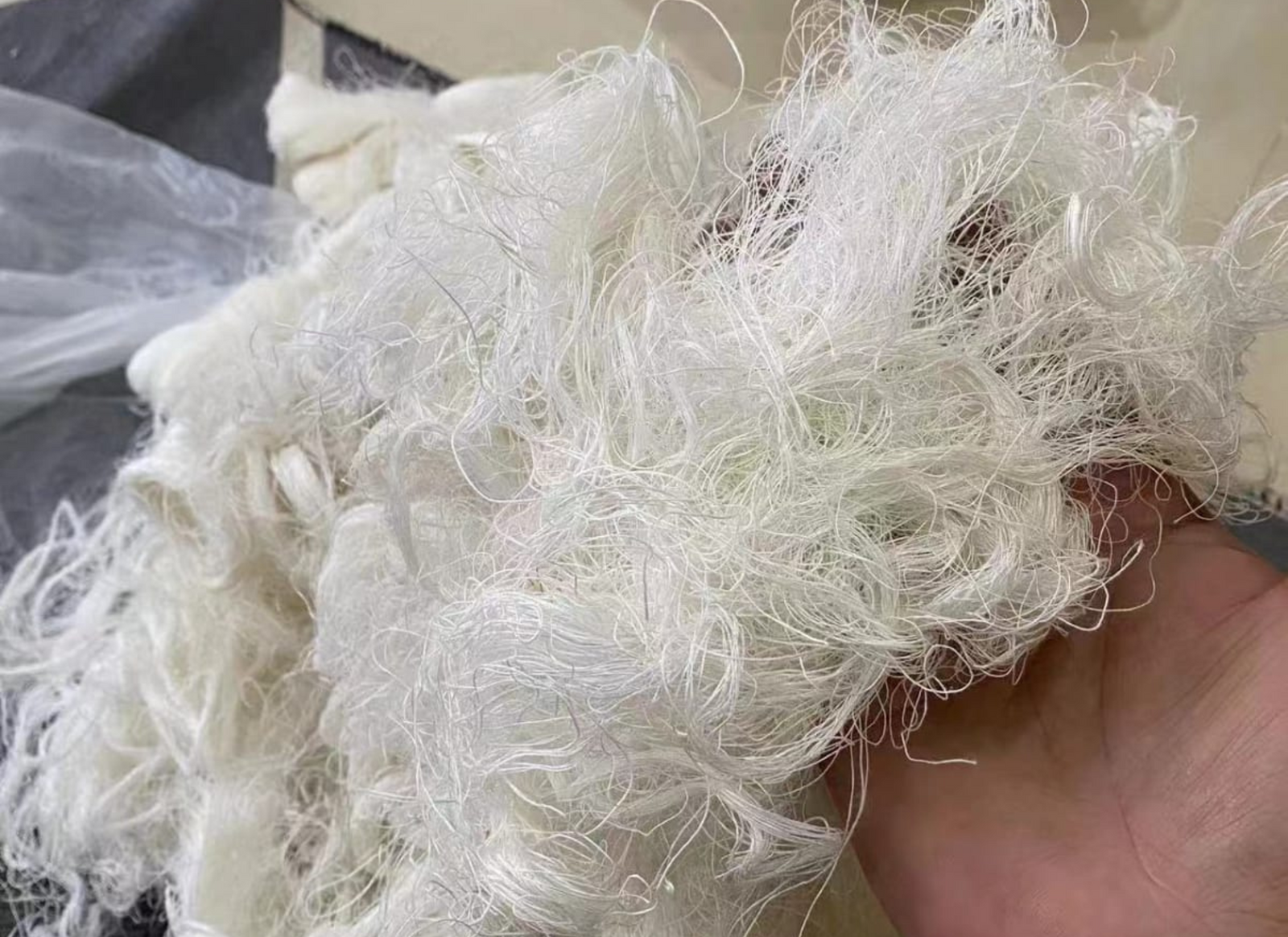 Recycled Linen Yarn Waste are the leftover or excessive warp/ weft thread on handlooms/ powerloom, to be specific the byproduct linen from industrial Linen weaving unit in India. There’s no dye lot on recycled Linen Fiber. These recycled fiber waste are the remnants of traditionally crafted Indian Linen yarn and are extensively used in making hats, mittens & hand scarves. Each lot has distinct colors, as its a mixed lot of white, natural white, off White or undy