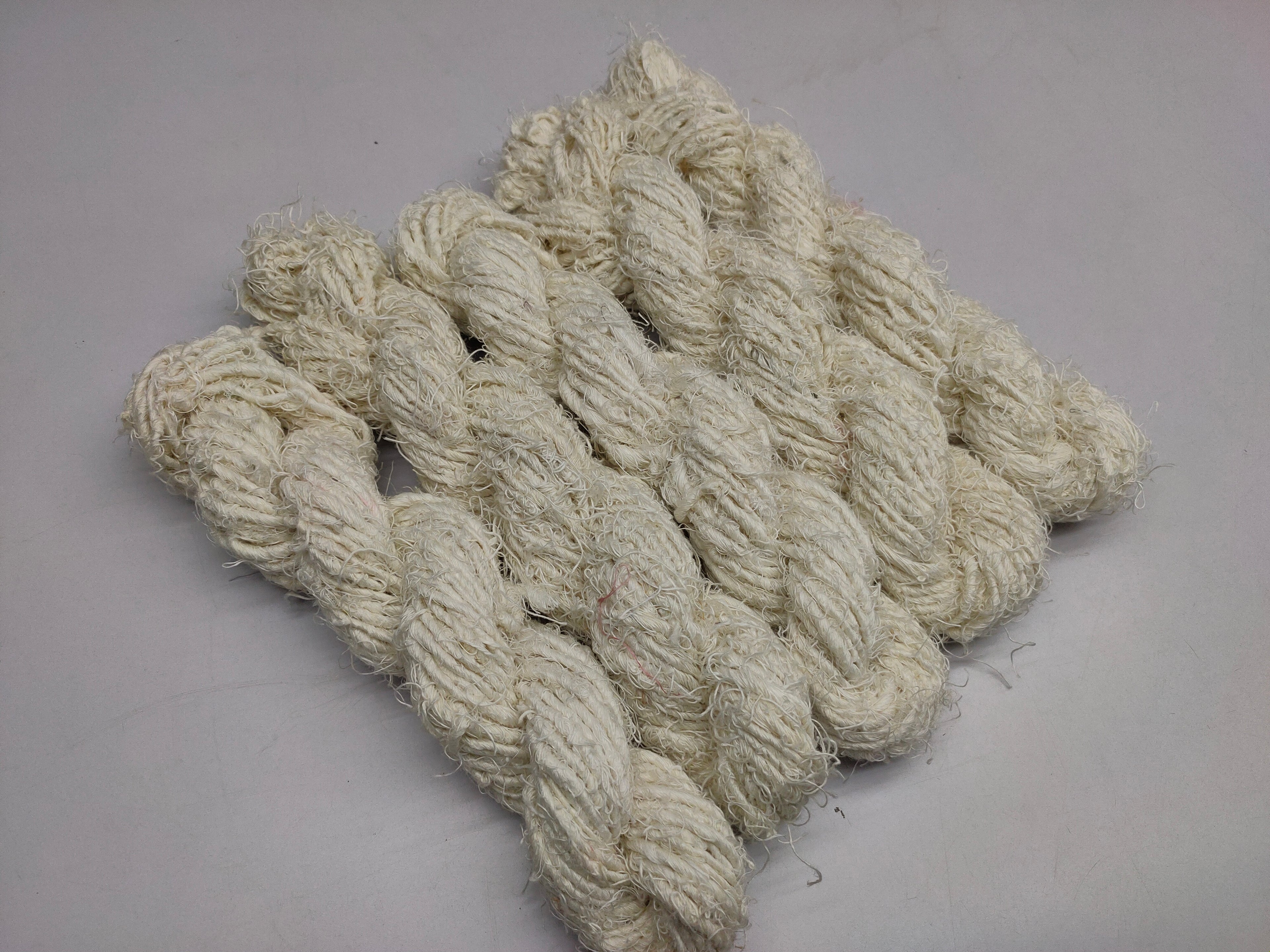 Recycled Linen Yarn natural is made from leftover or excessive warp/ weft thread on handlooms/powerloom, to be specific the byproduct linen from industrial Linen weaving unit in India. This knitting yarn is hand-spun, using drop spindle helping women cooperatives to earn their livelihood.