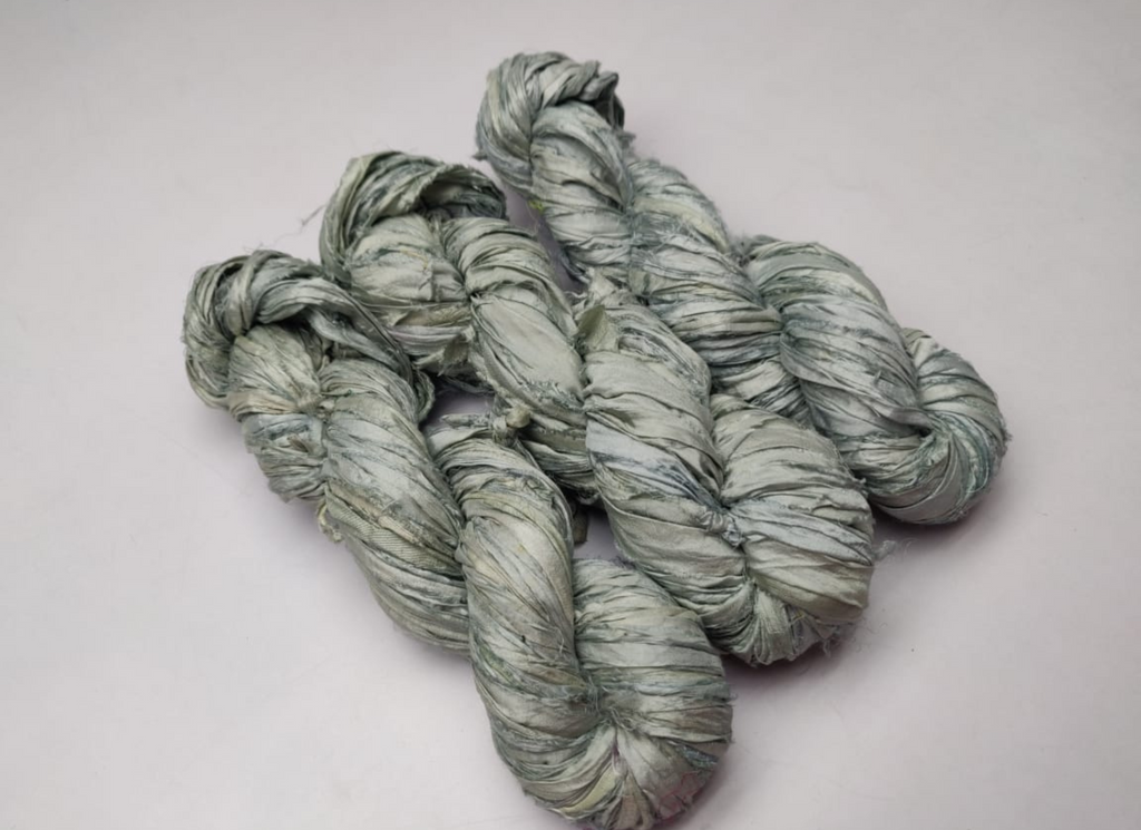 Sari silk Ribbon is the by-product of colorful saris that women wear in India. It is the loose ends of saris collected from industrial mills in India that is torn in stripes and sewn end to end to make beautiful and colorful ribbon
