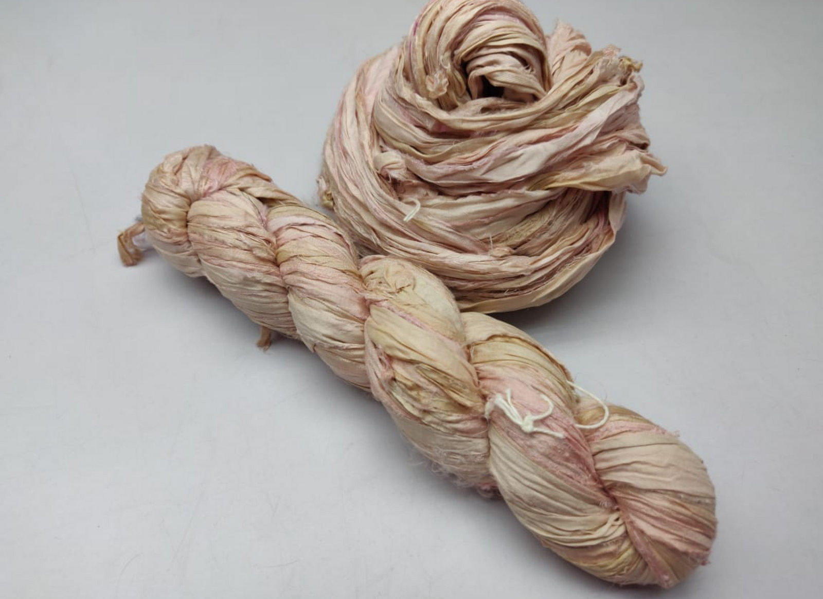 Sari silk Ribbon is the by-product of colorful saris that women wear in India. It is the loose ends of saris collected from industrial mills in India that is torn in stripes and sewn end to end to make beautiful and colorful ribbon
