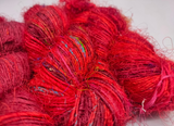 Recycled Sari Silk Yarn Prime&nbsp;Blood is available in multitude of colors, and being premium, you get extra length of yarn in the same weight. We fabricate Recycled Silk Yarn from the bi-product of sari and silk production units.