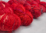 Recycled Sari Silk Yarn Prime&nbsp;Blood is available in multitude of colors, and being premium, you get extra length of yarn in the same weight. We fabricate Recycled Silk Yarn from the bi-product of sari and silk production units.