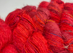 Recycled Sari Silk Yarn Prime&nbsp;Blood is available in multitude of colors, and being premium, you get extra length of yarn in the same weight. We fabricate Recycled Silk Yarn from the bi-product of sari and silk production units.