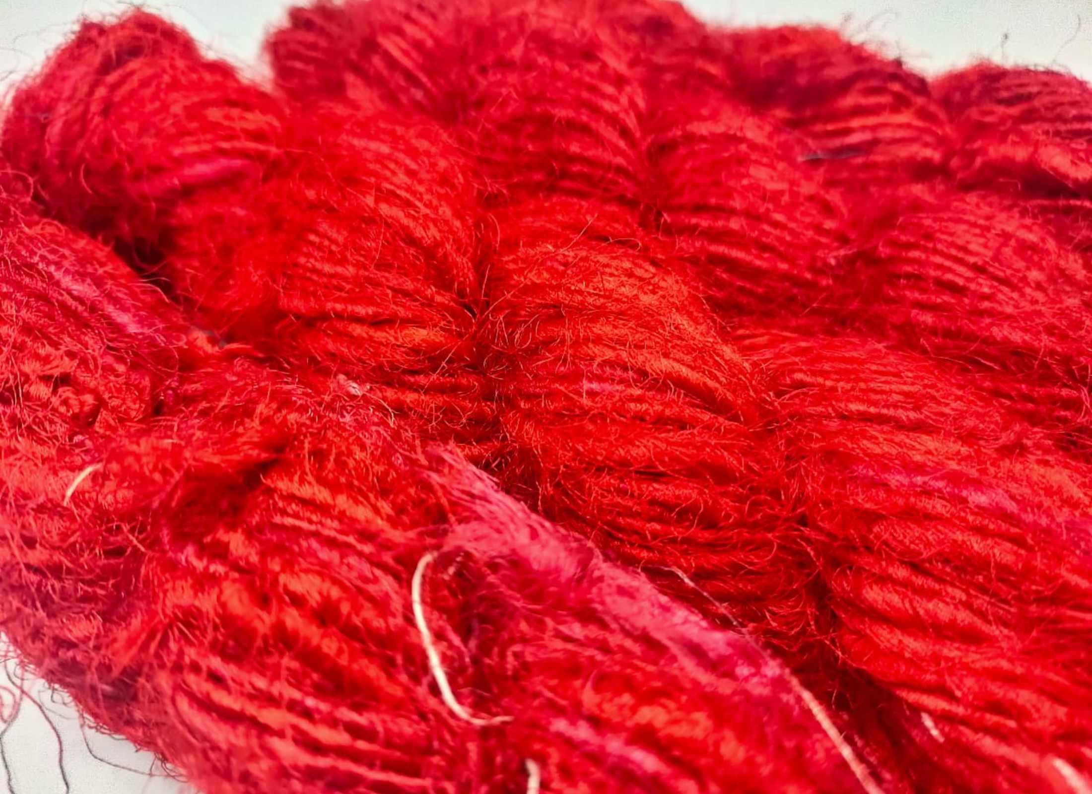Recycled Sari Silk Yarn is available in multitude of colors, and being premium, you get extra length of yarn in the same weight. We fabricate Recycled Sari Silk Yarn from the bi-product of sari and silk production units. The Yarn, available with us, is hand spun into bright hanks which is suitable for number of Handicrafts applications.