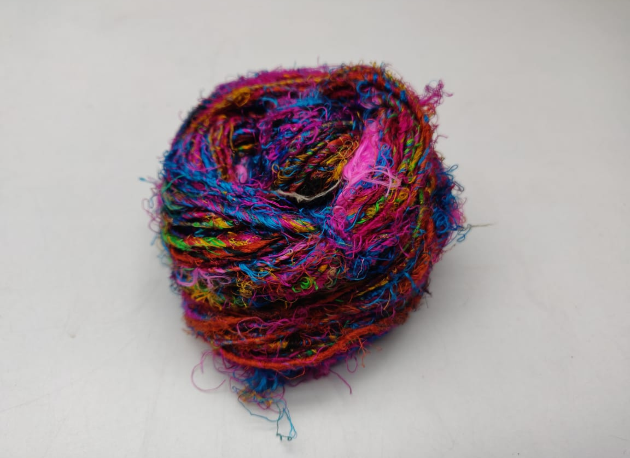 Recycle Sari Silk Yarn are the remnants of traditionally crafted Indian Saris and are extensively used in making hats, mittens, hued scarves, etc. We offer Recycle Sari Silk Yarn comprising of 100% and they are not over spun unlike some natural yarn. Each skein has distinct color, gauge, twist and texture. Varying in weight, our Recycled Sari Yarn are hailed for their quality and strength.