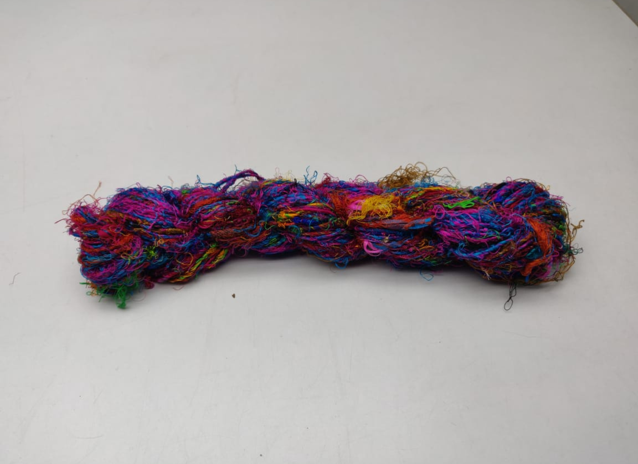 Recycle Sari Silk Yarn are the remnants of traditionally crafted Indian Saris and are extensively used in making hats, mittens, hued scarves, etc. We offer Recycle Sari Silk Yarn comprising of 100% and they are not over spun unlike some natural yarn. Each skein has distinct color, gauge, twist and texture. Varying in weight, our Recycled Sari Yarn are hailed for their quality and strength.
