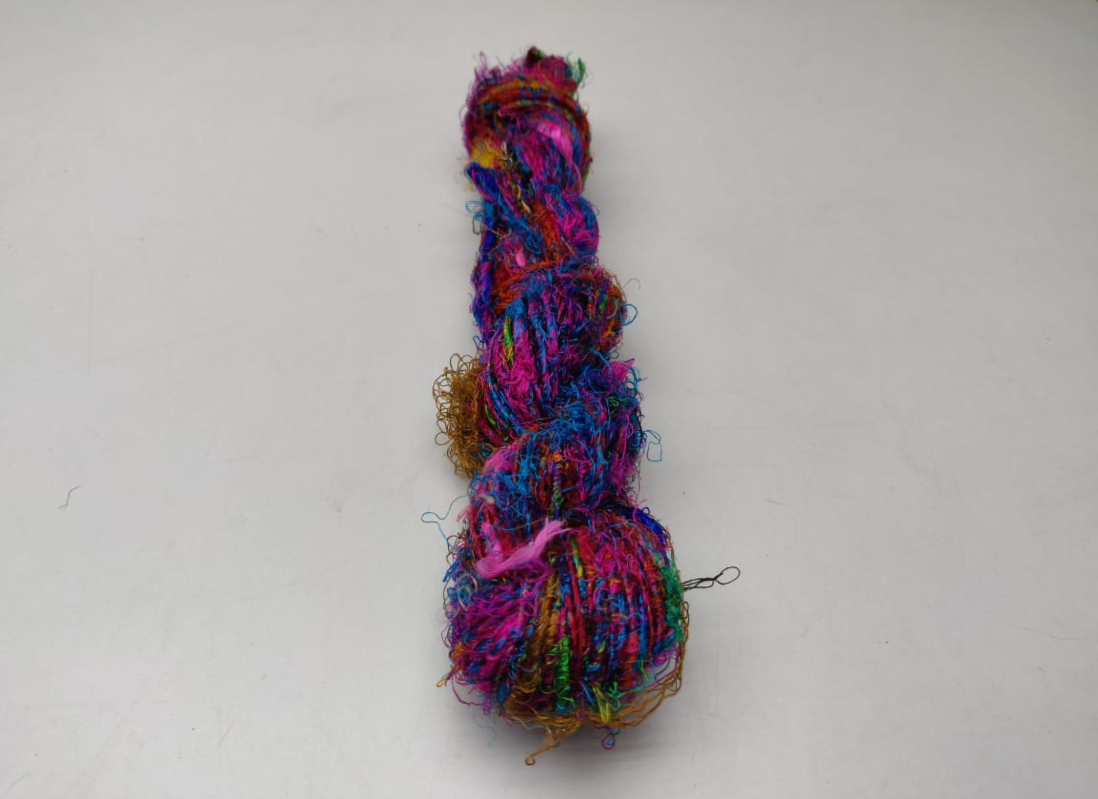 Recycled Sari Silk Yarn are the remnants of traditionally crafted Indian Saris and are extensively used in making hats, mittens, hued scarves, etc. We offer Recycle Sari Silk Yarn comprising of 100% and they are not over spun unlike some natural yarn. Each skein has distinct color, gauge, twist and texture. Varying in weight, our Recycled Sari Yarn are hailed for their quality and strength.