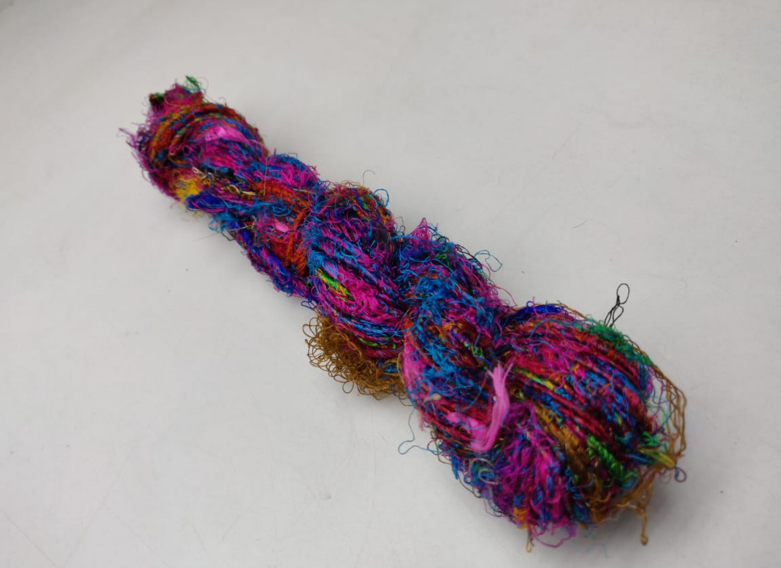 Recycled Sari Silk Yarn are the remnants of traditionally crafted Indian Saris and are extensively used in making hats, mittens, hued scarves, etc. We offer Recycle Sari Silk Yarn comprising of 100% and they are not over spun unlike some natural yarn. Each skein has distinct color, gauge, twist and texture. Varying in weight, our Recycled Sari Yarn are hailed for their quality and strength.