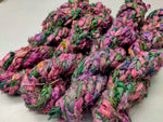 Braided Sari Silk Ribbon yarn is made of pure silk and is approximately an inch wide through out. Due to its handmade nature there might occasionally be variations in width. When silk fabric is cut and made into saris, wraps, and veils, there is always a bit left over. Rather than throw that waste fiber into the trash, it has been made into a beautiful, unique, soft yarn..!! Direct from India, this yarn is a truly recycled product. It is a bulky weight and is soft and easy to knit or crochet.