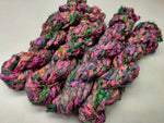 Braided Sari Silk Ribbon yarn is made of pure silk and is approximately an inch wide through out. Due to its handmade nature there might occasionally be variations in width. When silk fabric is cut and made into saris, wraps, and veils, there is always a bit left over. Rather than throw that waste fiber into the trash, it has been made into a beautiful, unique, soft yarn..!! Direct from India, this yarn is a truly recycled product. It is a bulky weight and is soft and easy to knit or crochet.