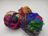 Recycled Sari silk Ribbon-Rolls is the by-product of colorful saris that women wear in India. It is the loose ends of saris collected from industrial mills in India that is torn in stripes and sewn end to end to make beautiful and col