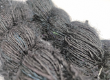 Recycled Sari Silk Yarn Prime - Black is available in multitude of colors, and being premium, you get extra length of yarn in the same weight. We fabricate Himalaya Silk Yarn from the bi-product of sari and silk production units. The Yarn, available with us, is hand spun into bright hanks which is suitable for number of Handicrafts applications. Himalaya Sil