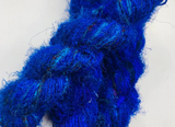 Recycled Sari Silk Yarn Prime - Indigo is available in multitude of colors, and being premium, you get extra length of yarn in the same weight. We fabricate Himalaya Silk Yarn from the bi-product of sari and silk production units. 