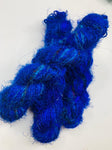 Recycled Sari Silk Yarn Prime - Indigo is available in multitude of colors, and being premium, you get extra length of yarn in the same weight. We fabricate Himalaya Silk Yarn from the bi-product of sari and silk production units. 